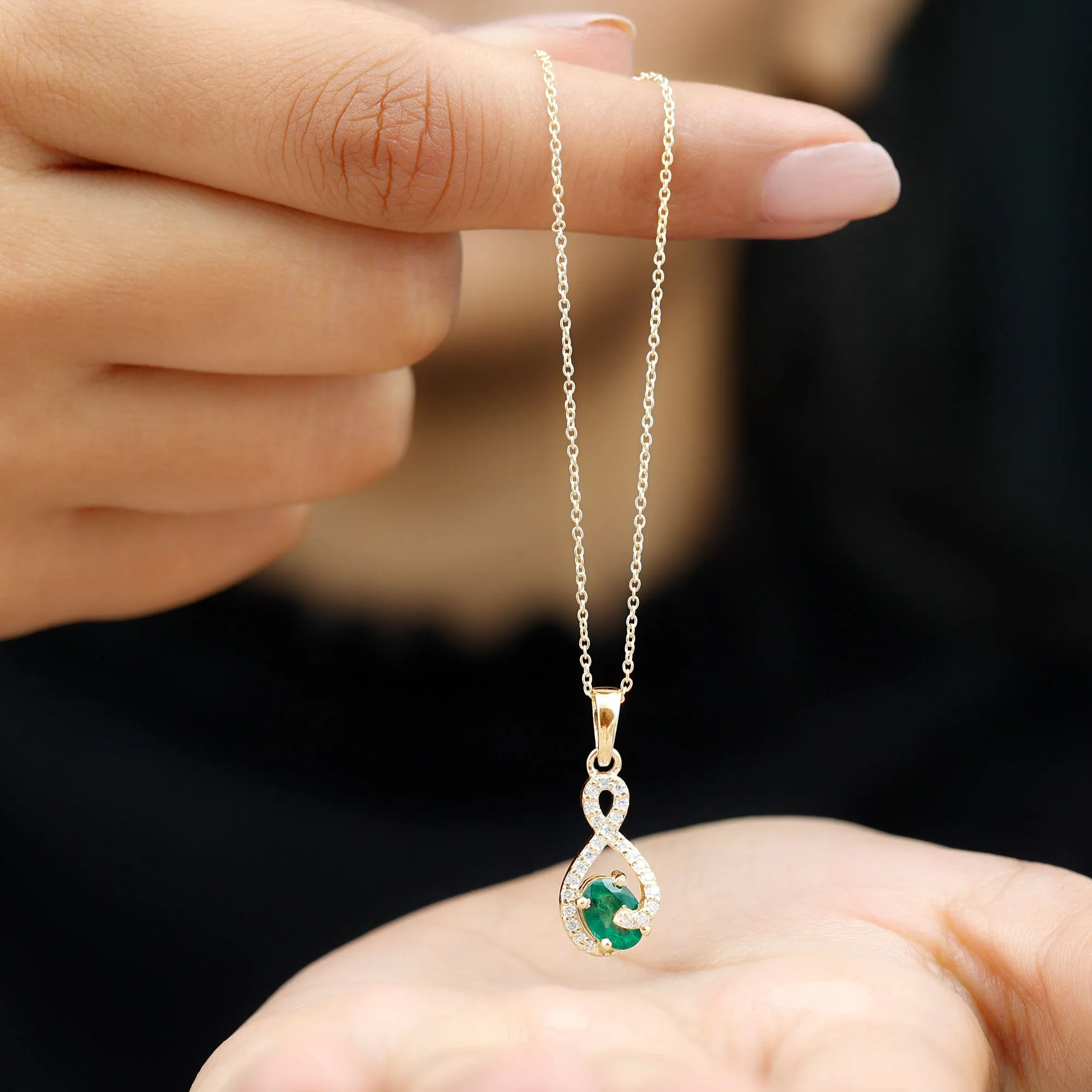 1 CT Oval Cut Emerald Infinity Pendant with Diamond