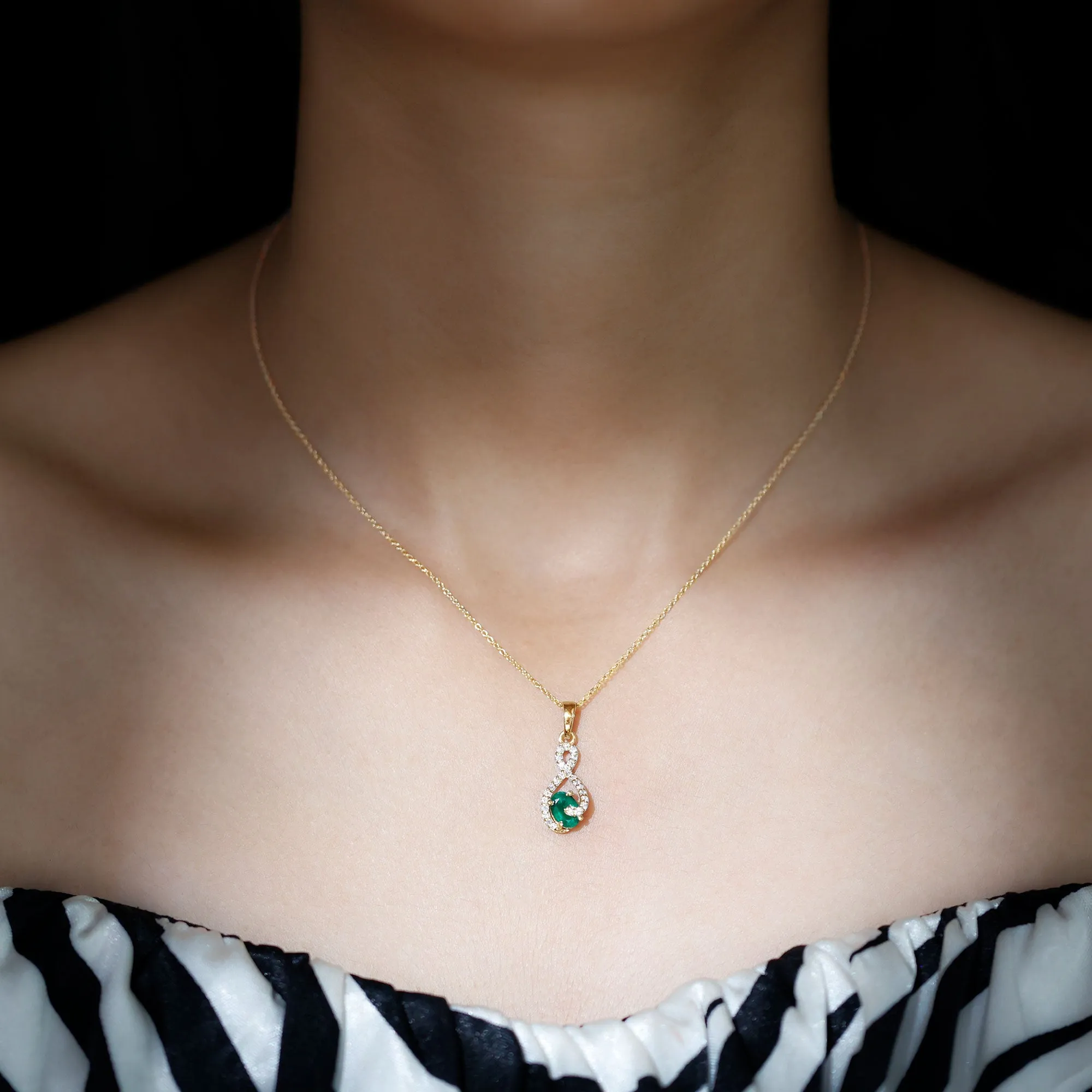 1 CT Oval Cut Emerald Infinity Pendant with Diamond