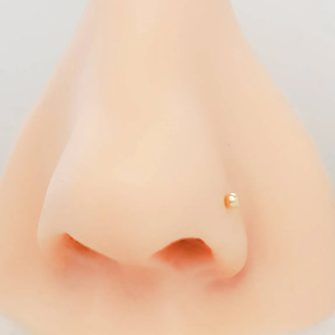 Tiny Bead Nose Stud in 14K Gold